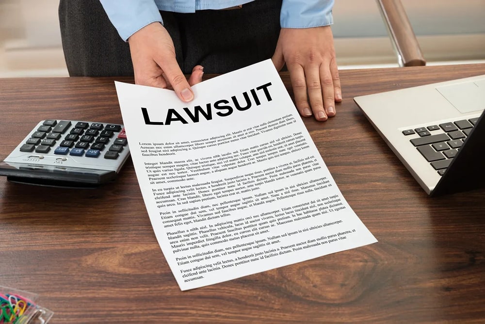 Lawsuit papers given by the lawyer