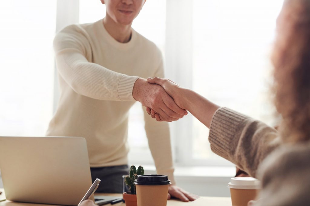 Shakehands agreement with both person