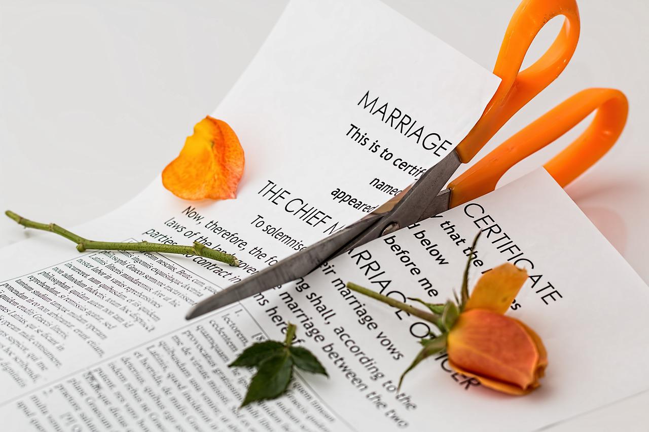 Divorce papers cut with scissors