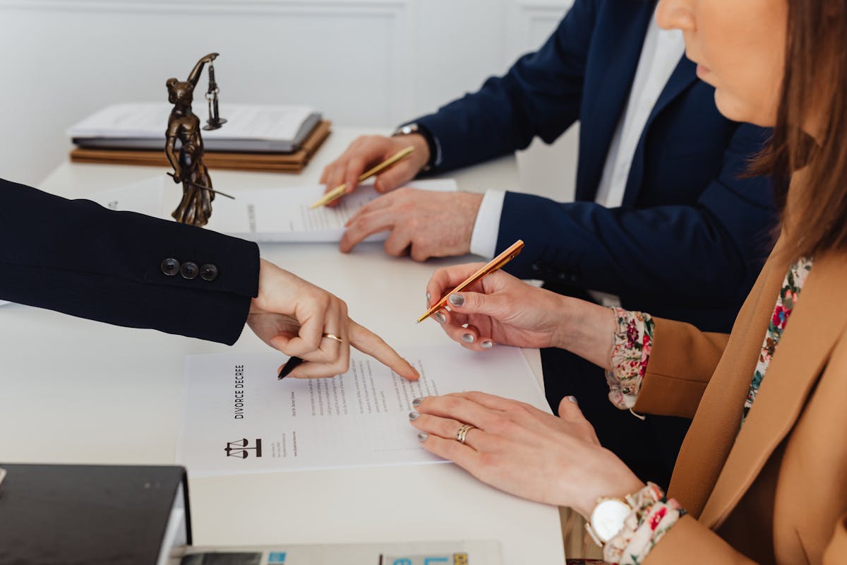 couple signing their expedited divorce papers in California